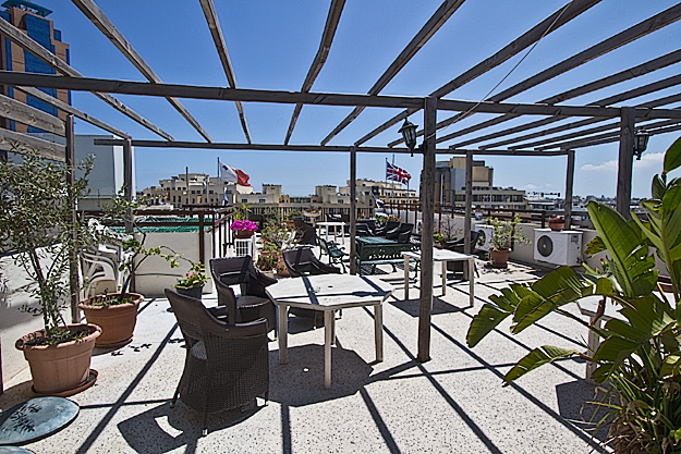 The roof deck at ElanGuest is a popular spot to bask in Malta's abundant sunshine