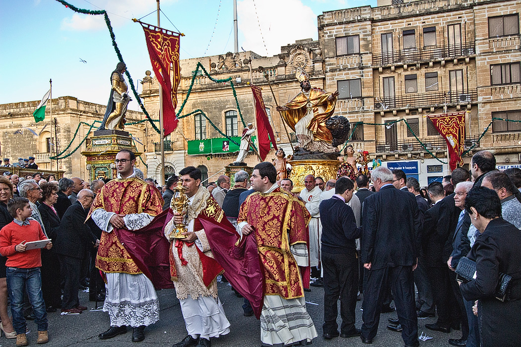 Priests lead procession during the Feast of St. Publius, the patron saint of the city of Floriana, on the island of Malta