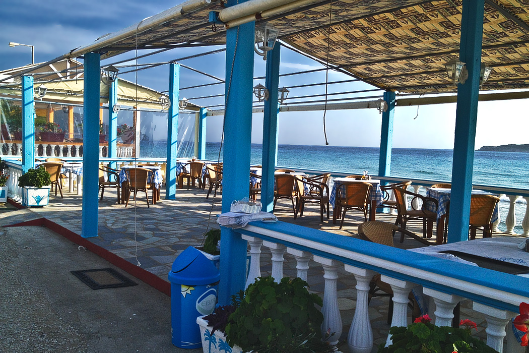 Open-air beachfront restaurant in Arillas, on the island of Corfu, Greece