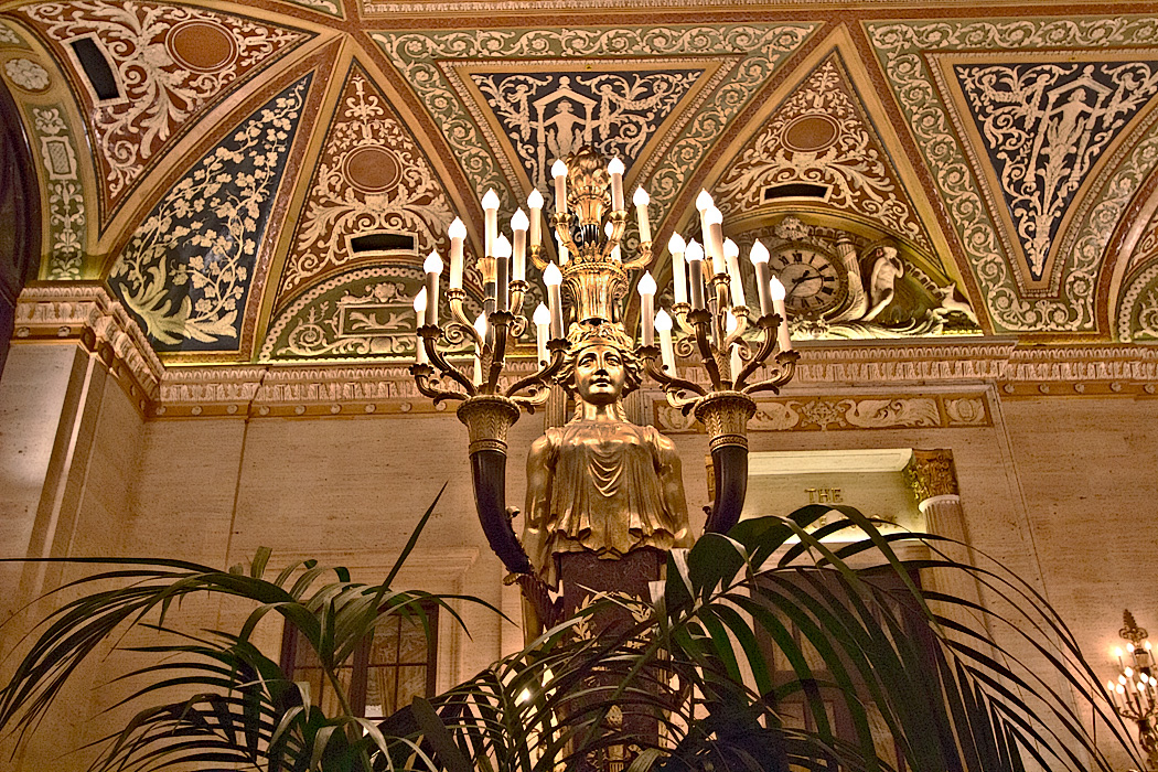 One of a pair of Italian Renaissance gilt-bronze torchieres in the lobby of Chicago's historic Palmer House Hotel