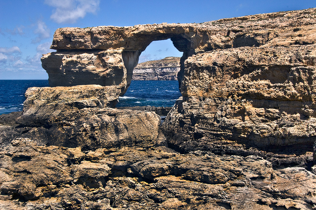 The Azure Window, a wind and wave-carved arch in a limestone promontory on Gozo in the Maltese Islands