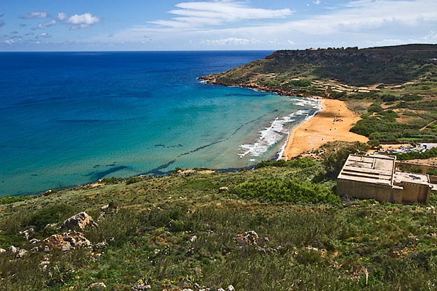 Calypso Beach on Gozo, seen from the cliffs atop Calypso Cave, said to be the place where Odysseus was imprisoned for seven years by the nymph Calypso