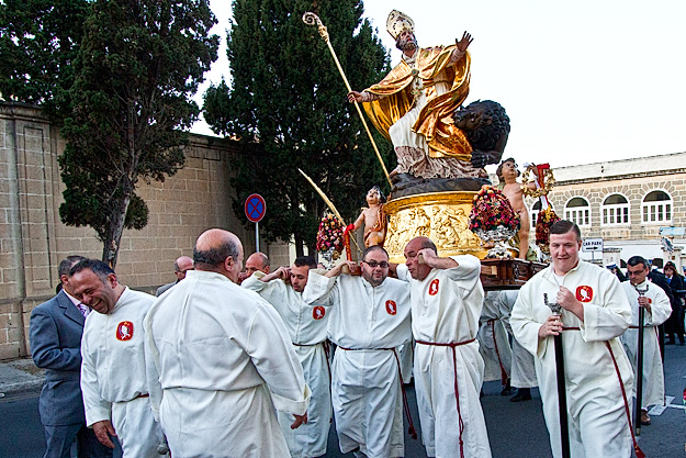 Priests carry the icon of St.. Publius through the streets