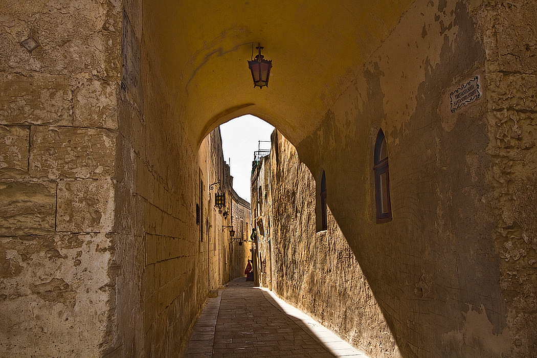 Narrow, winding passageways like this one riddle the walled city of Mdina in Malta