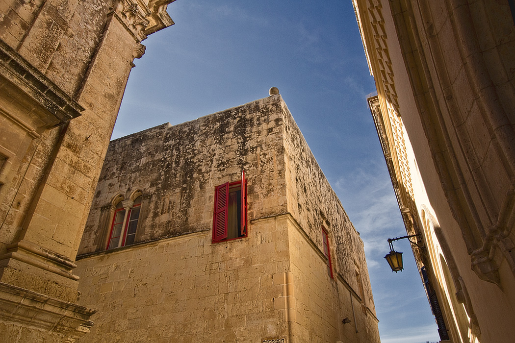 Blue skies and golden limestone complement one another in Mdina, the ancient capital of Malta