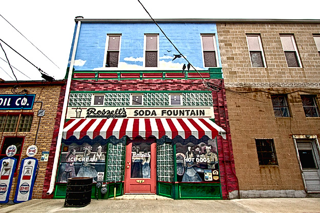 Murals depicting life during the heyday of Route 66 decorate buildings in Pontiac, Illinois