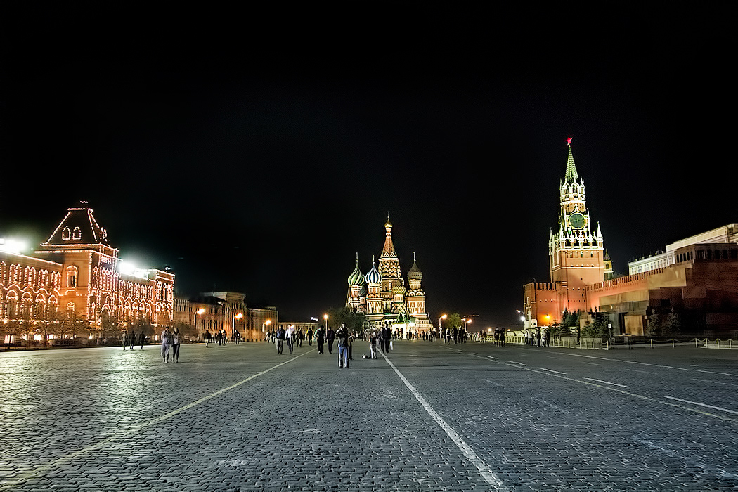 Red Square in Moscow at night, left to right: Gum Department Store, St. Basil's Cathedral, and Kremlin with Lenin Mausoleum