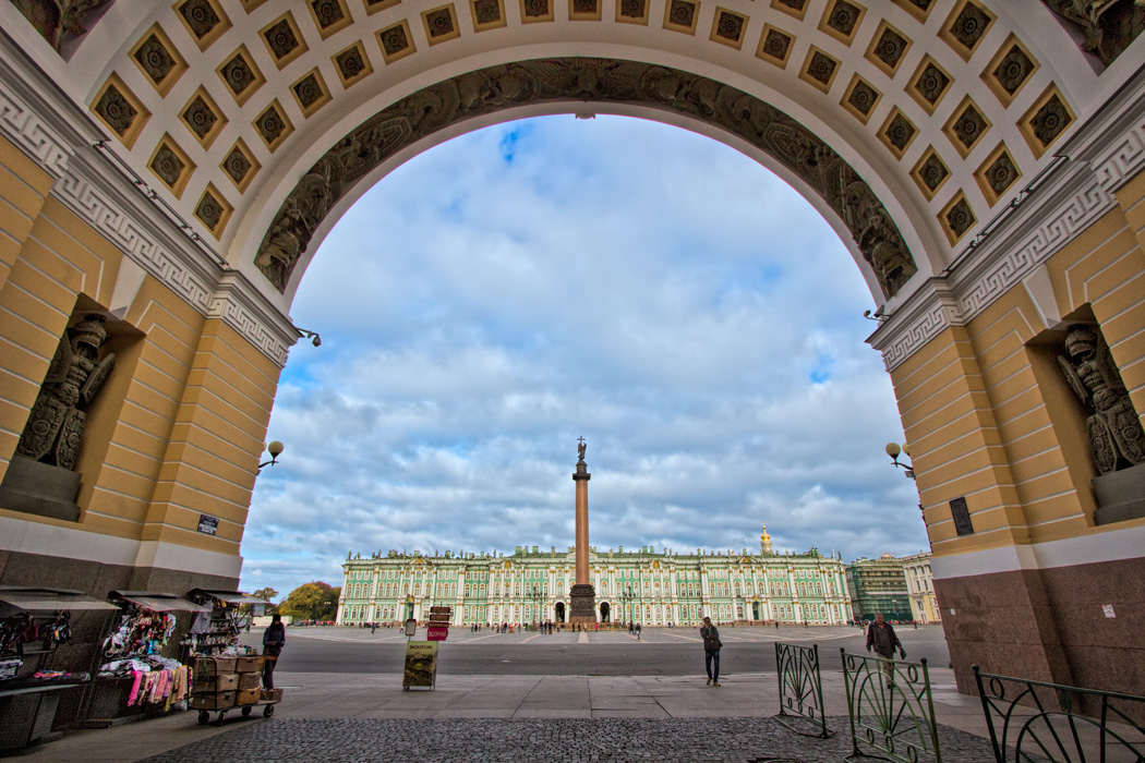 Alexander Column and Hermitage Museum, seen through the arch of the General Staff Building of the Hermitage in St. Petersburg, Russia
