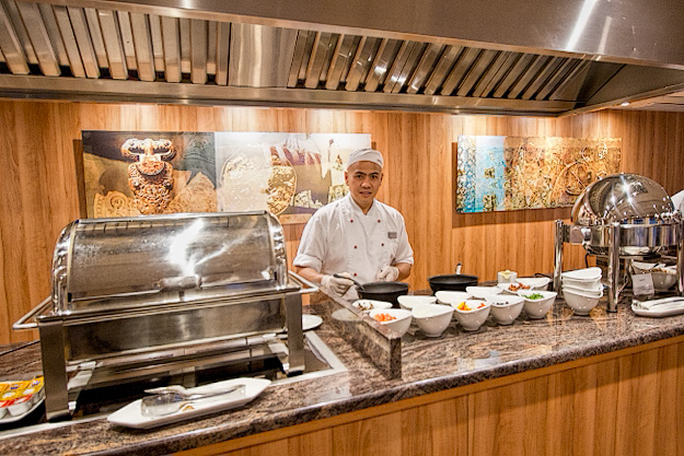 Carving and pasta station in the dining room of the Viking Akun