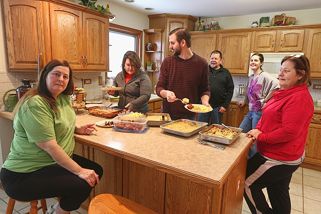 Stuffing ourselves at our Thanksgiving day breakfast. Left to right: my sister Linda; my niece Kelly; nephew-in-law Tony; brother-in-law Dale; niece Gina; and sister Nancy