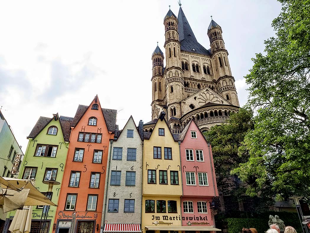 In Cologne, Germany, Great St. Martin Church towers over Fishmarket Square, with it's 14th to 17th century townhouses and open-air cafes