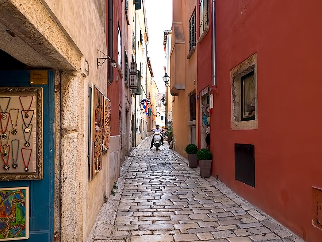 Grisia Street in Rovinj, Croatia, the main road leading to Saint Euphemia Church, which crowns the hill. Grisia Street is renowned for its art galleries and working artists.top town