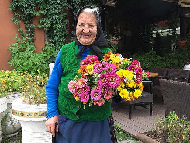 In Niš, this flower vendor was full of smiles when I asked to take her photo