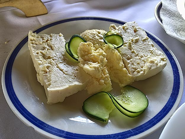 Kajmak (a Serbian delicacy) and cheese, one of my lunch dishes at the Veliki Buk waterfall in southern Serbia. The yellow Kajmak in the center, a cross between butter and cream cheese, made a great spread for the fresh bread round we were served fresh from the wood-fired oven