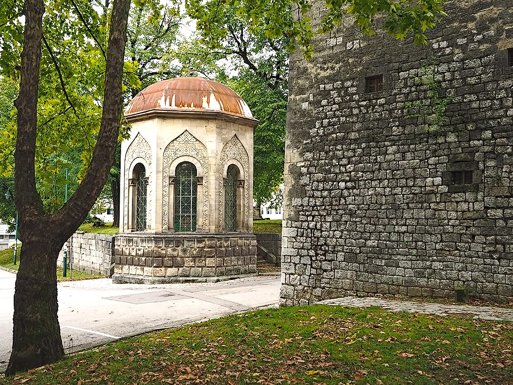 Two of the most interesting structures in Bihac, Bosnia-Herzegovina: an uncommon octagonal style "Turbe" (Ottoman mausoleum) and the square Captain's Tower, which is one of the oldest buildings in town and today houses the Regional Museum.