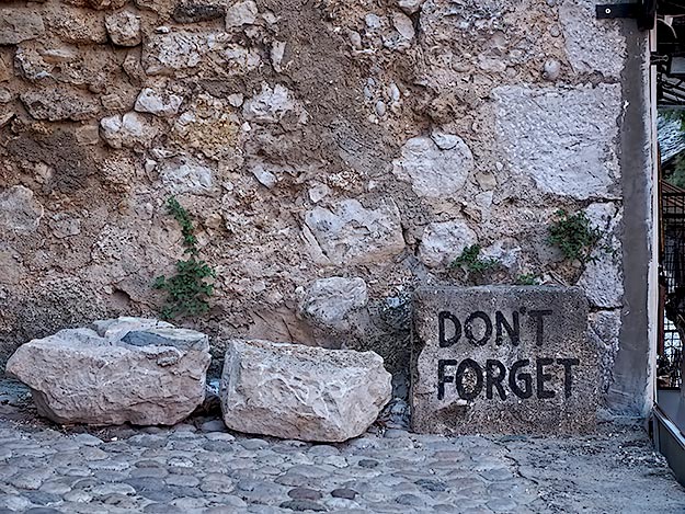Signs all around Mostar proclaim "Don't Forget" - in remembrance of the Bosnian War