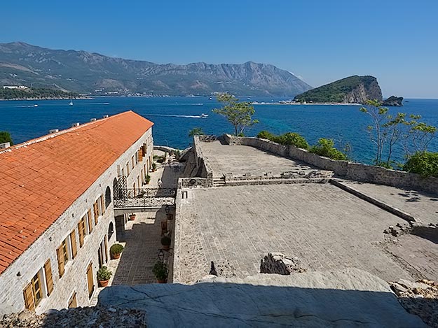 Overlooking the citadel, the 15th century fortifications built by the Venetians to protect Budva from sea attacks. The barracks on the left were added in the early 19th century when the city came under Austrian control.
