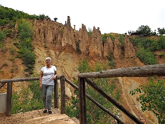 Posing beneath the "hoodoos" - a geological formation in southern Serbia