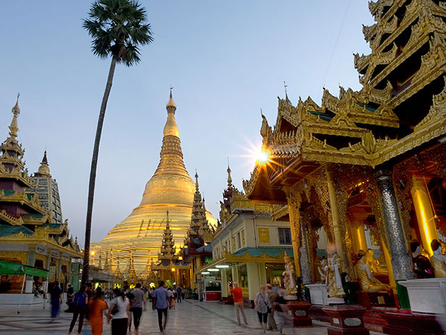 Shwedagon Pagoda seems to glow from within as dusk falls