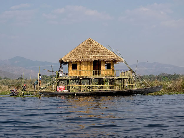 Typical floating house in Inle Lake, Myanmar, built of woven bamboo matting