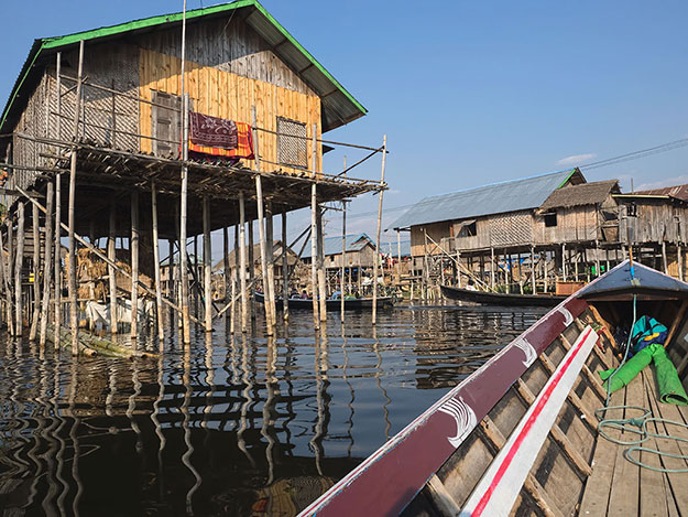 Typical bamboo and woven mat houses built on high stilts solve the problem of severe fluctuations in the depth of Inle Lake during the dry and rainy seasons