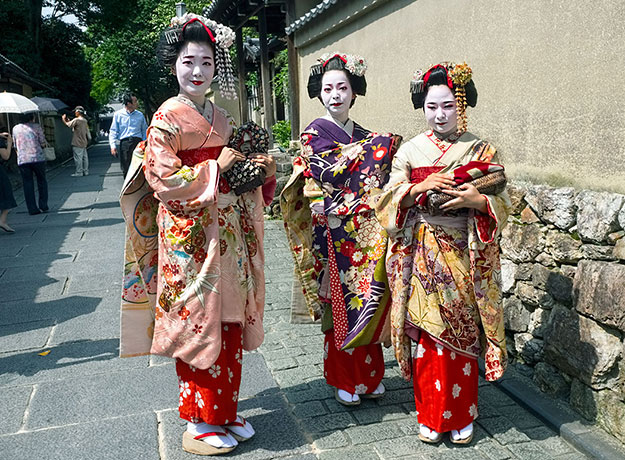 If you're lucky when visiting Japan, you could see Geisha like these, who were walking in the temple district in Kyoto