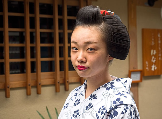 Girl in cotton Yukata with traditionalJapanese hairstyle in Kyoto, Japan