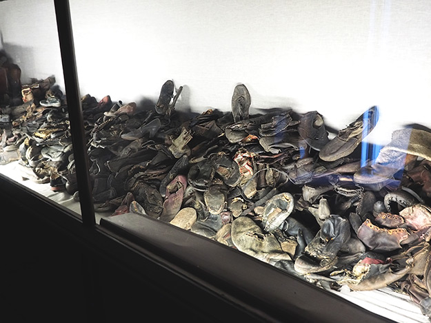 Piles of shoes that the Nazis confiscated from those who were about to be gassed