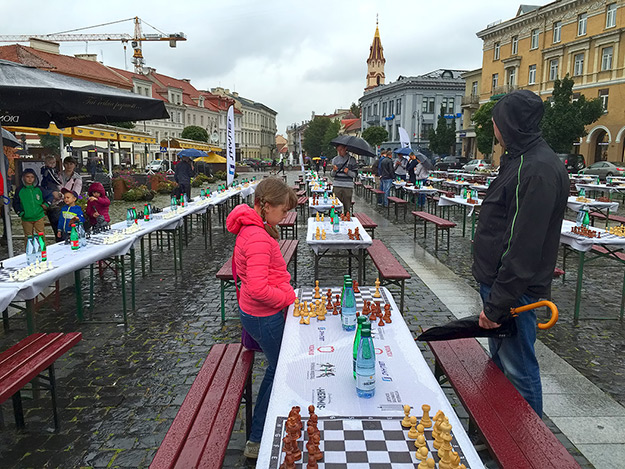 Rain doesn't put a damper on events in the Lithuanian capital of Vilnius. These competitors simple played under umbrellas.