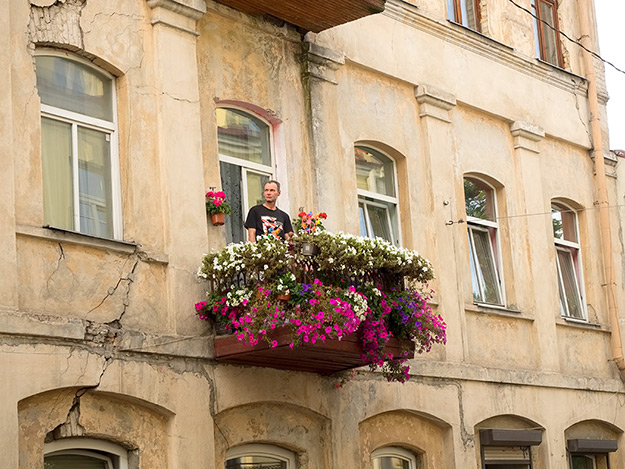 Like many of the old buildings in Vilnius, this one is in dire need of repair, however residents do what they can to brighten up their surroundings