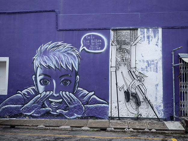 Street Art in George Town, Penang, includes this mural, titled "Teach You Speak Hokkien"