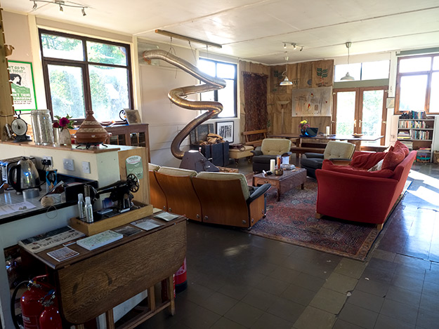 The common living room at EcoYoga Scotland, which enjoys gorgeous views over the lake and mountains