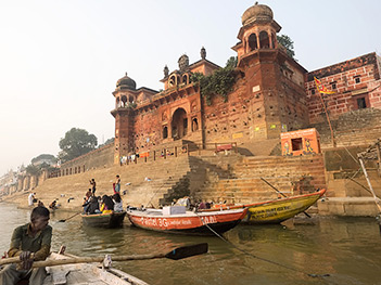 Dawn boat ride in Varanasi, India, takes me past Chet Singh Ghat and the historic Chet Singh Fort