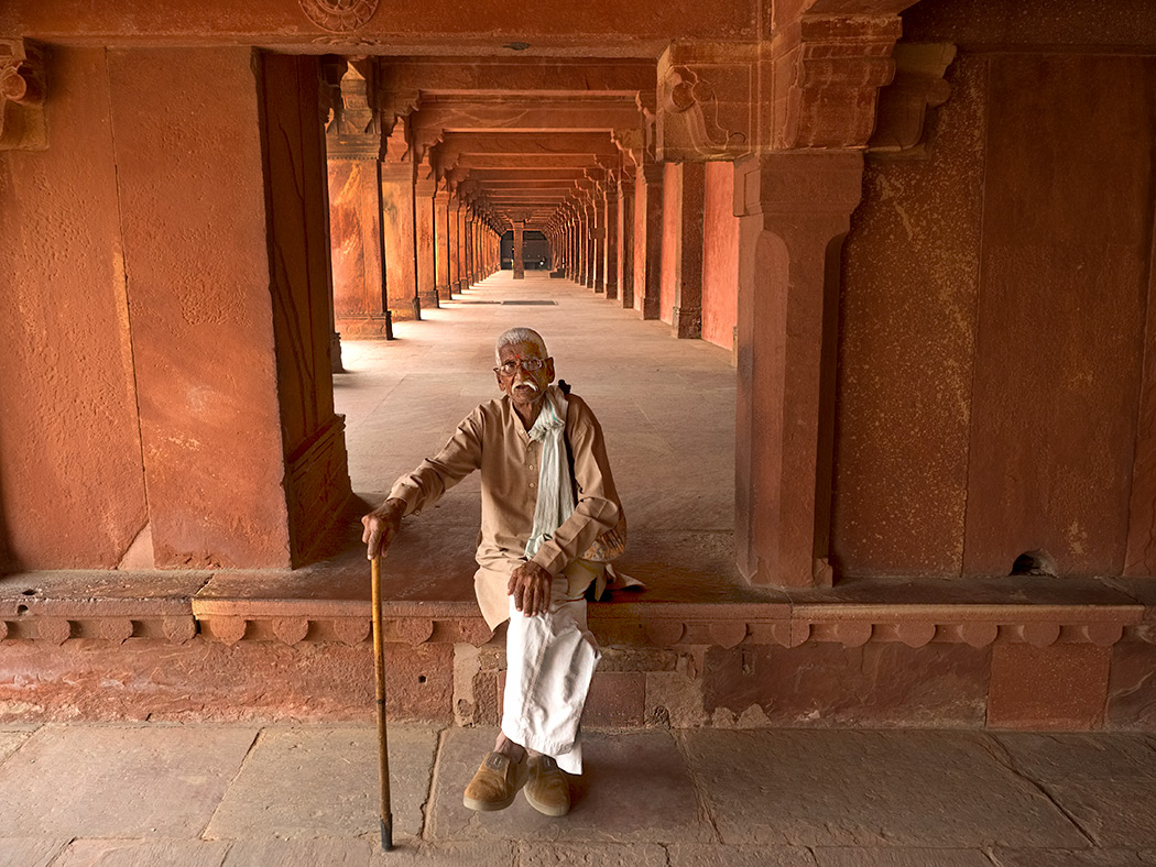 Dignified elderly man poses for me at Fatehpur Sikri Palace in Agra, India