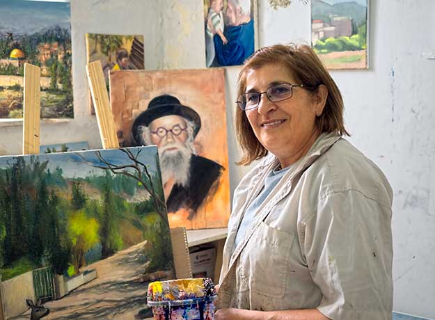 One of the orthodox women who paints at Alliance House in Jerusalem