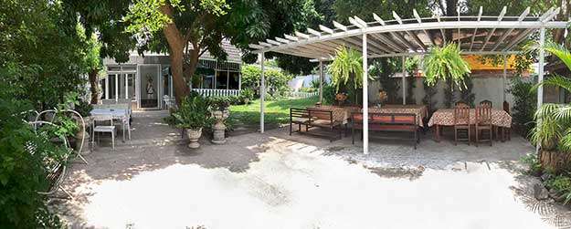 Panoramic view of the exterior of Cozy Cafe and Coffee, one of the best coffee shops in Chiang Mai, Thailand and my personal favorite