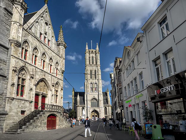 The Bell Tower (left) and Saint Bavo Cathedral (center) in Ghent. The church is home to the famed “Adoration of the Mystic Lamb” (also known as the Ghent Altarpiece) by Jan and Hubert van Eyck