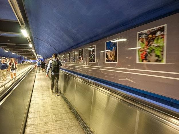 Even the moving walkways that connect various levels of T-Centralen station feature framed artwork