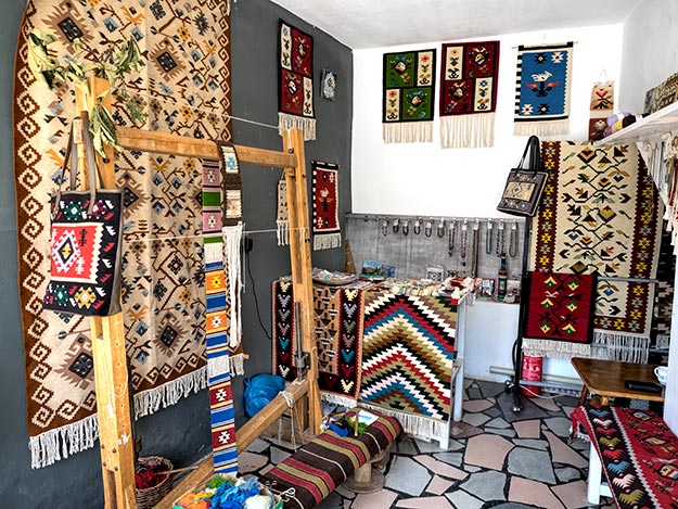 Array of traditional hand-loomed designs at Chushkarcheto Carpet Store in Chiprovisti, Bulgaria