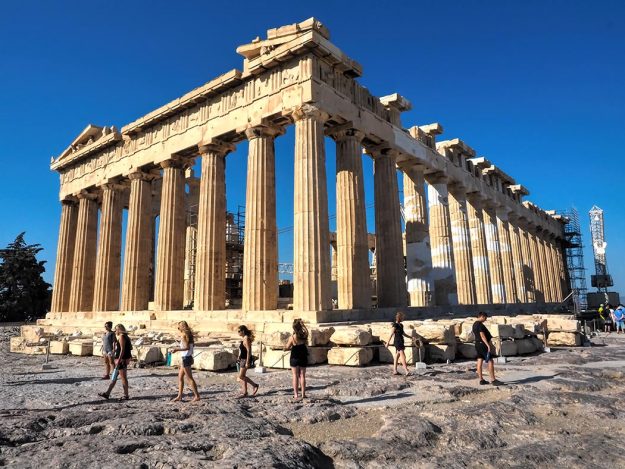 Greece-Athens-Parthenon-perched-atop-the-Acropolis The ancient Parthenon, a classic Greek temple to the goddess Athena, perches atop a massive rock outcropping in the center of Athens, Greece