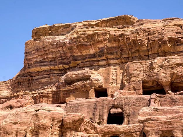 Many Bedouins have abandoned the houses were they were relocated by the Jordanian government in 1985 and returned to the caves where they were born, like these in Petra