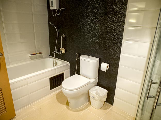 Modern bath of my apartment in Chiang Mai has a huge soaking tub and a separate shower
