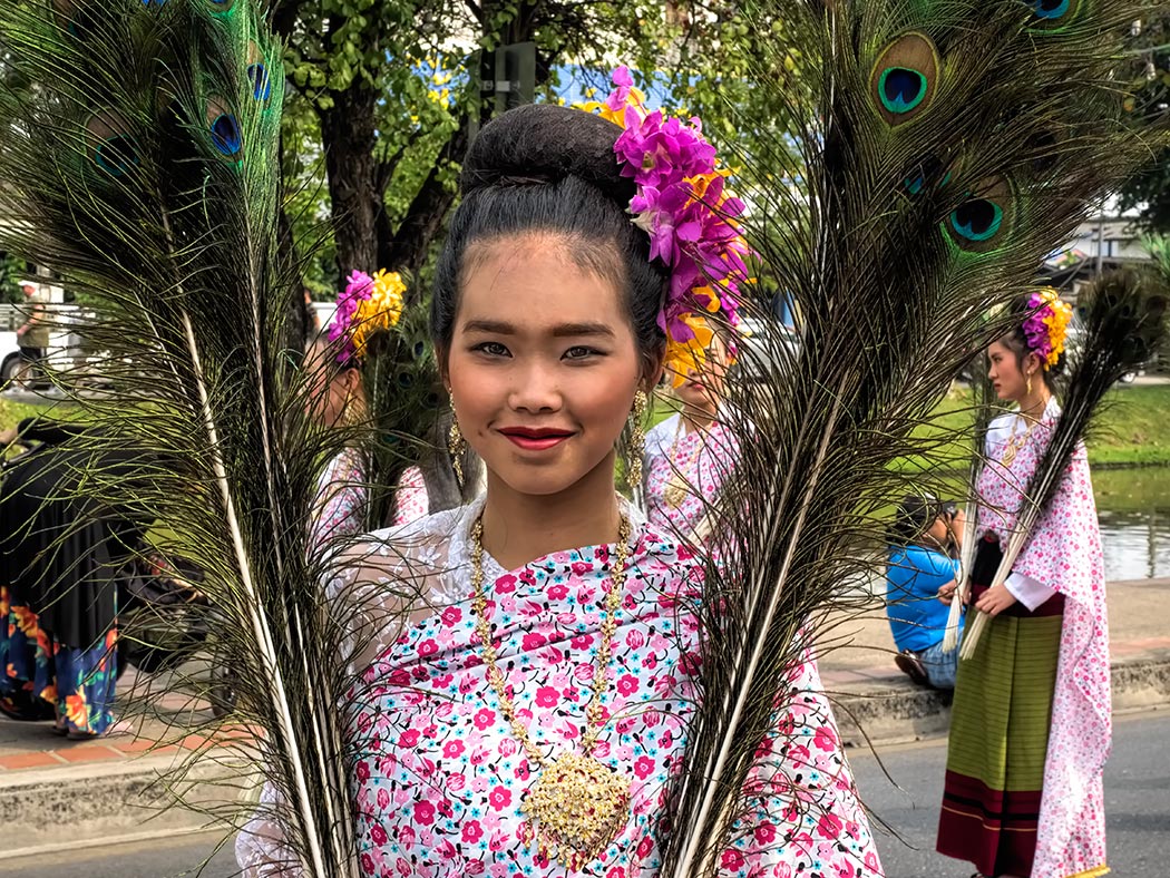 Women wear traditional dress at the 2018 Flower Festival in Chiang Mai, Thailand