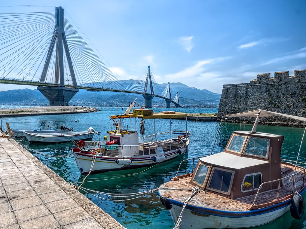 Antirrio Harbor and Fort, with the new Rio Antirrio Bridge in background, which connects the Greek mainland to the Peloponnese Peninsula