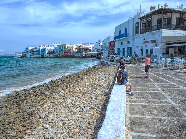 Houses, shops, and cafes perched on the edge of the sea have earned this area of Chora Town the nickname Little Venice