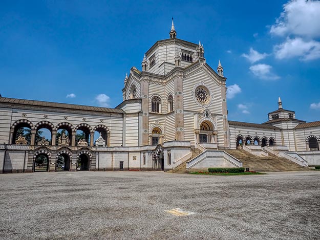 The Famedio, a Neo-Medieval syle building of marble and stone, serves as the entrance to Monumental Cemetery in Milan