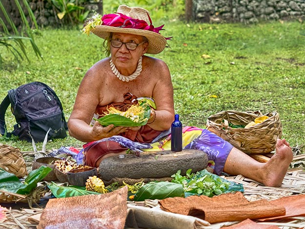 Mama Sara, head crafter on the island of Fatu Hiva in the Marquesas Islands of French Polynesia, demonstrates how to make a floral headdress known as an "umu hei"