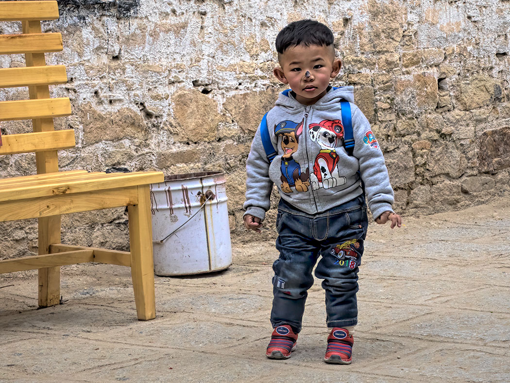 In Tibetan Buddhism the noses of children are marked with soot to protect them from evil spirits