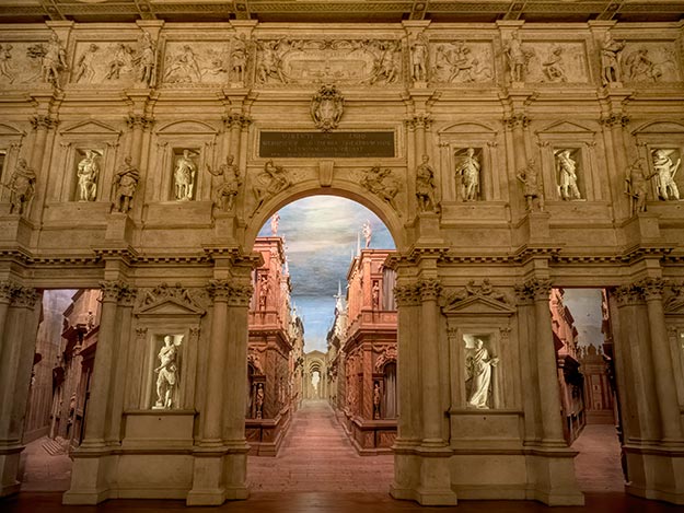 Seven Streets of Thebes stage set in Teatro Olimpico in Vicenza Olimpico with night lighting