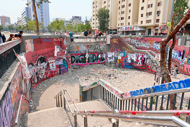 Demonstrations continue in Santiago, Chile. This barricaded and graffiti covered Metro station at Plaza Italia is often the epicenter of the protests.